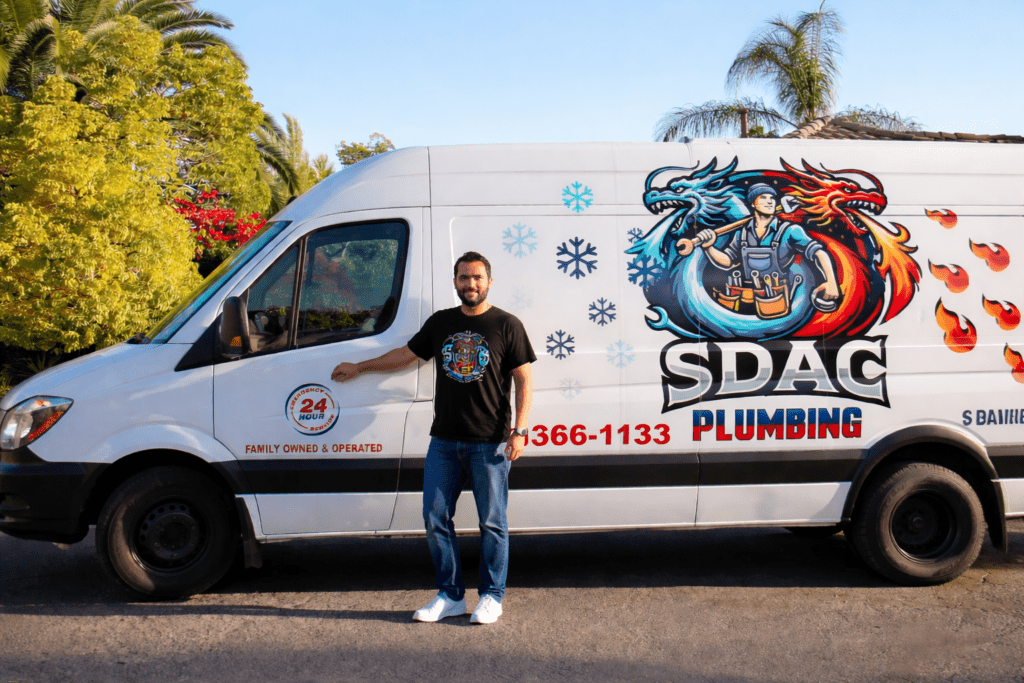 A SDAC plumbing technician and the SDAC van
